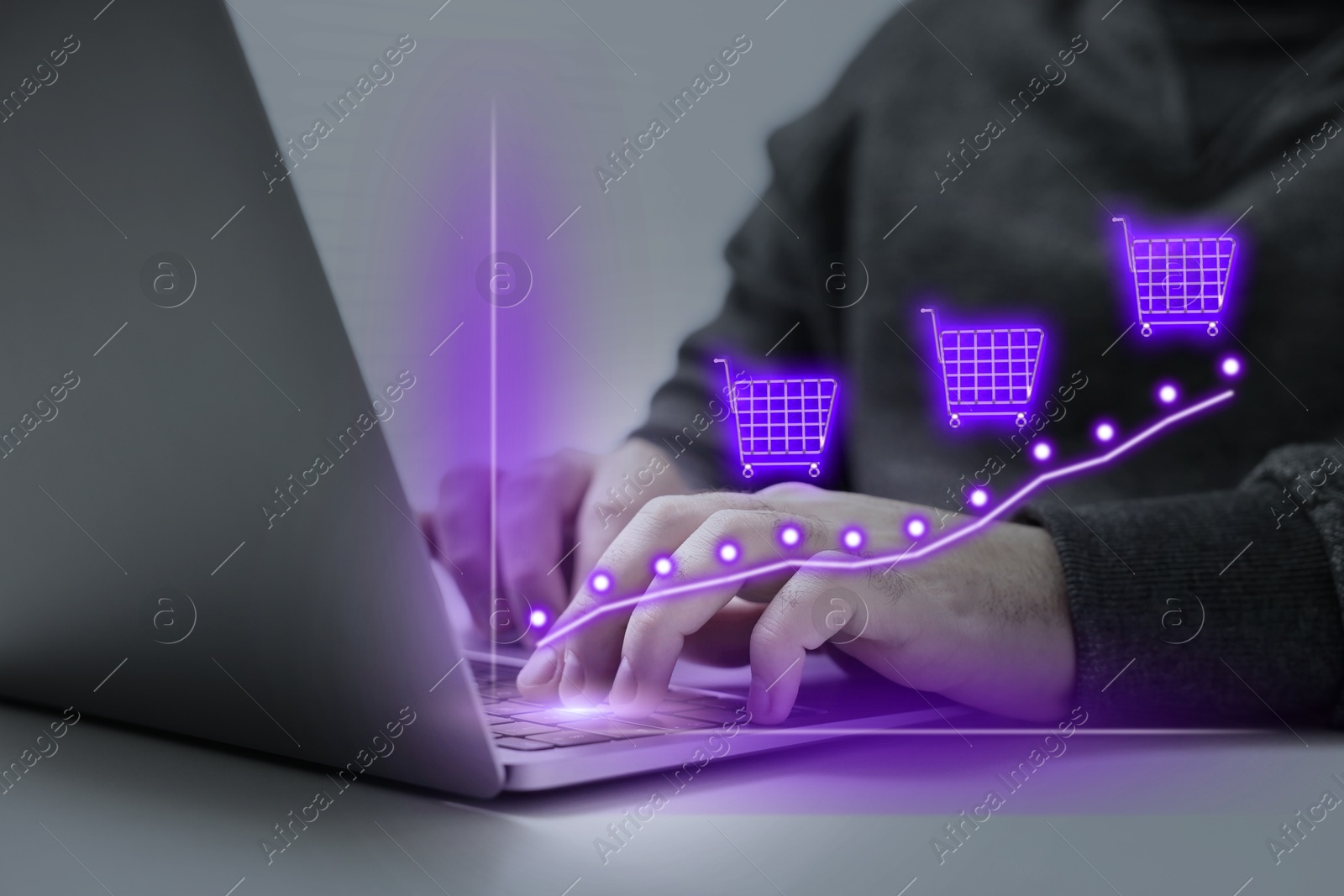 Image of Man tracking price growth using laptop, closeup. Graph over device. Internet shopping concept