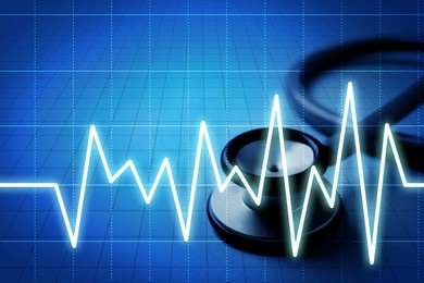 Image of Stethoscope and heartbeat line on blue gradient background, closeup. Healthcare concept