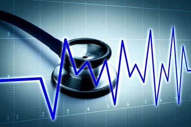 Image of Stethoscope and heartbeat line on color gradient background, closeup. Healthcare concept