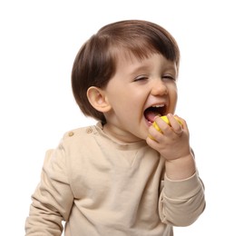 Photo of Cute little child eating tasty mochi on white background