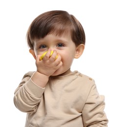 Photo of Cute little child eating tasty mochi on white background