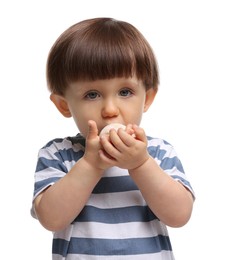 Photo of Cute little child eating tasty mochi on white background