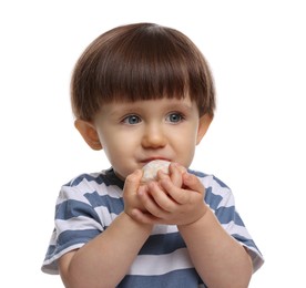 Photo of Cute little child eating tasty mochi on white background