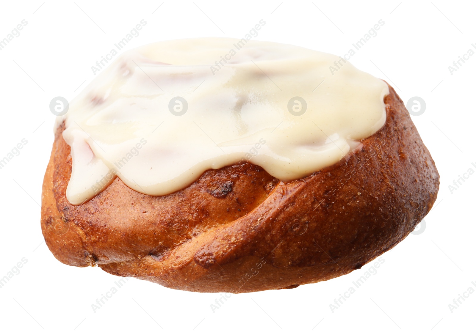 Photo of Tasty cinnamon roll with cream isolated on white