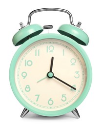 Photo of One turquoise alarm clock isolated on white