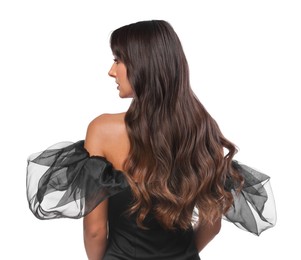 Photo of Hair styling. Woman with wavy long hair on white background, back view