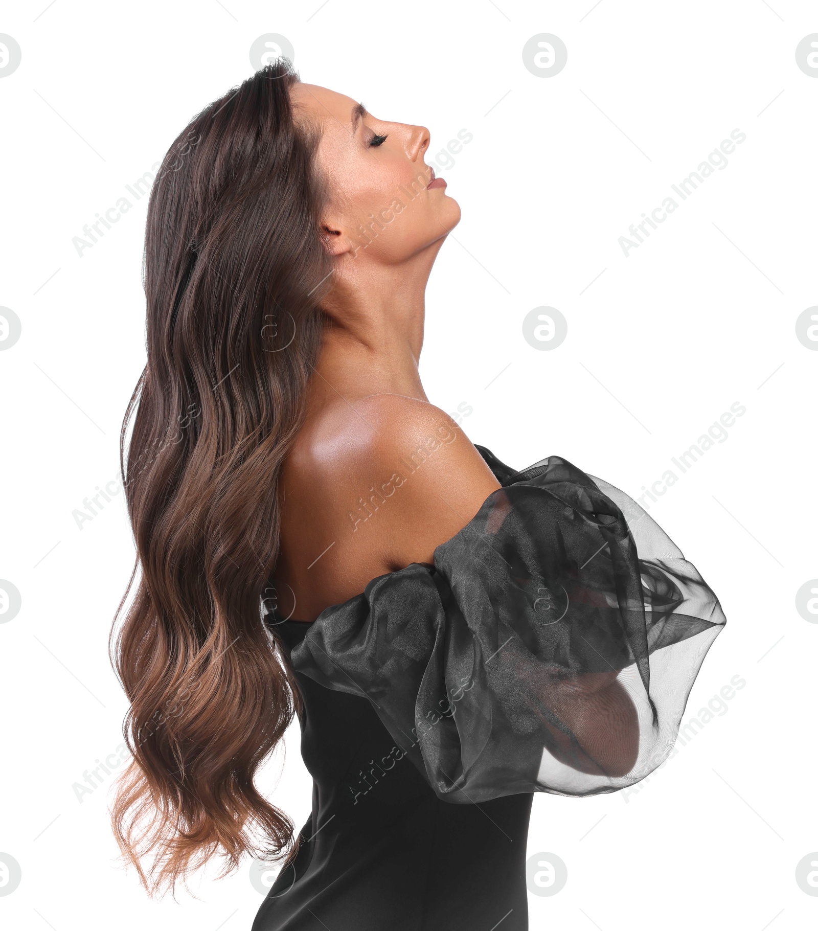 Photo of Hair styling. Beautiful woman with wavy long hair on white background