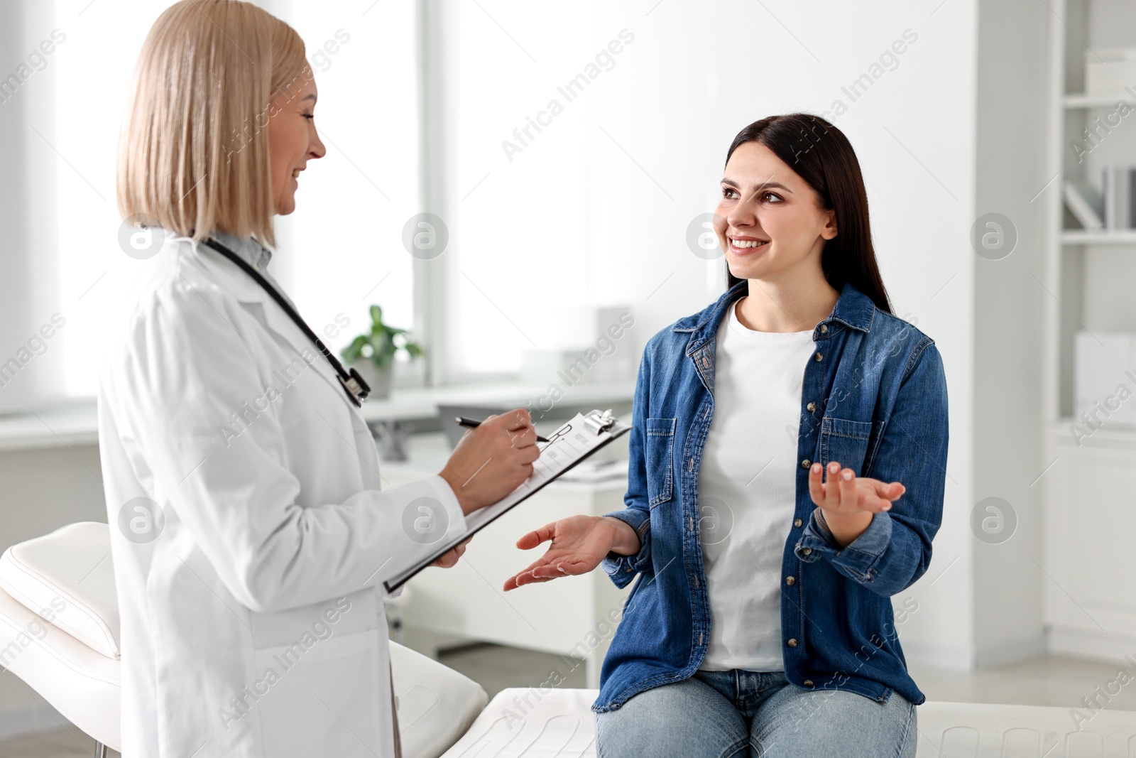 Photo of Woman having appointment with doctor in hospital