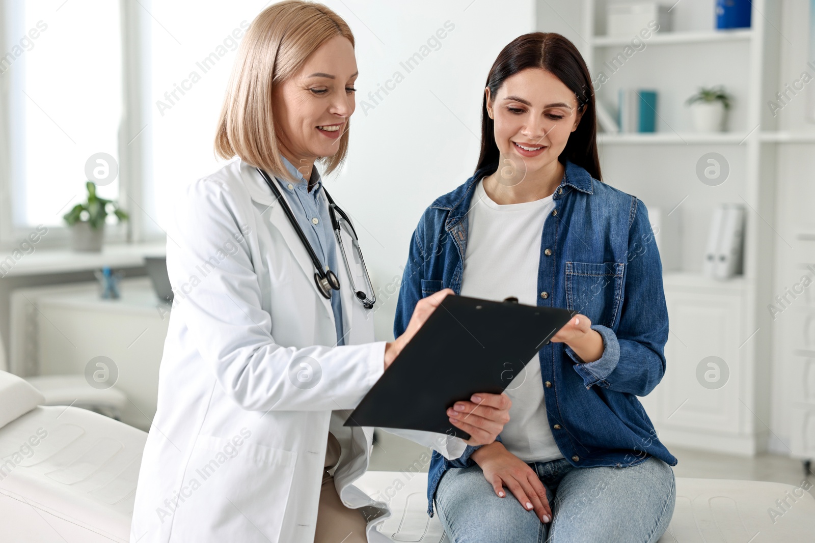 Photo of Woman having appointment with doctor in hospital