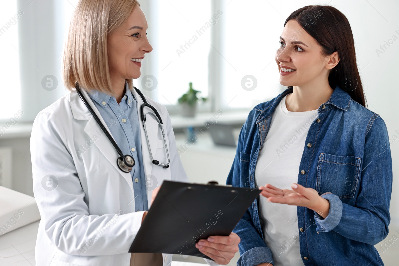 Photo of Woman having appointment with doctor in hospital