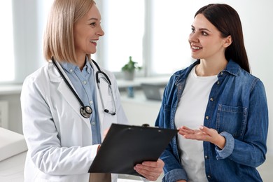 Photo of Woman having appointment with doctor in hospital