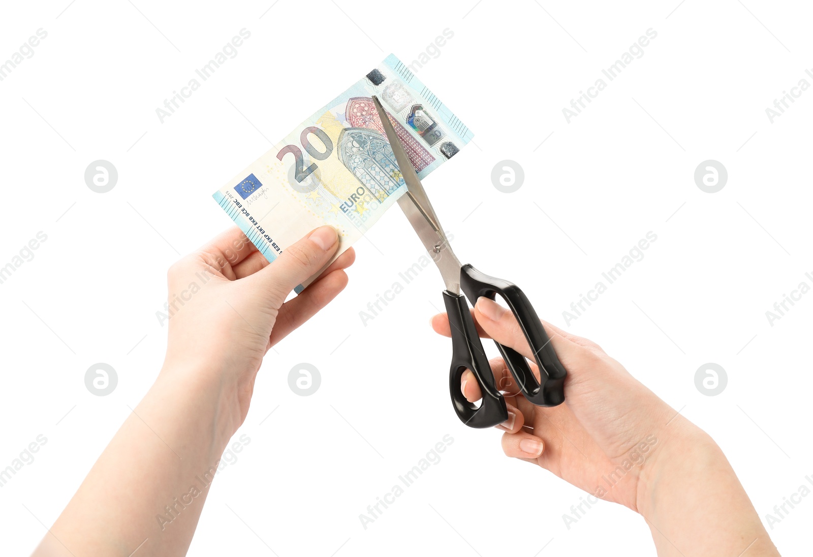 Photo of Woman cutting euro banknote on white background, closeup