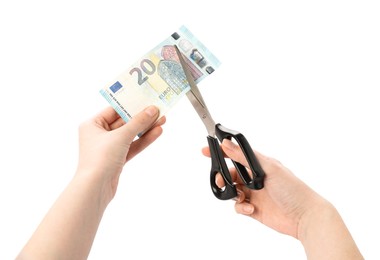 Photo of Woman cutting euro banknote on white background, closeup