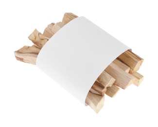 Photo of Palo santo sticks wrapped in paper on white background