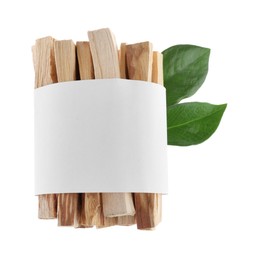 Photo of Palo santo sticks wrapped in paper and green leaves on white background