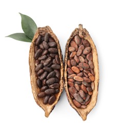 Photo of Cocoa pods with beans and leaves isolated on white, top view