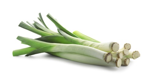 Photo of Fresh leeks isolated on white. Spicy vegetable