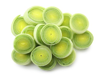 Photo of Pieces of fresh leeks isolated on white, top view