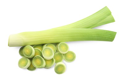 Photo of Whole and cut leeks isolated on white, top view