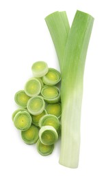 Photo of Whole and cut leeks isolated on white, top view