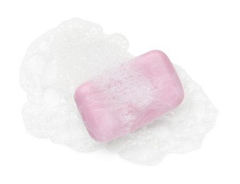 Photo of Violet soap with foam on white background, top view