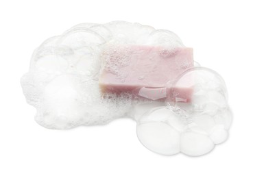 Photo of Bar soap with foam on white background