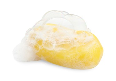 Photo of Yellow soap with foam on white background