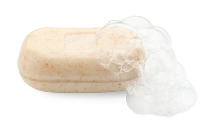 Photo of Bar soap with foam on white background