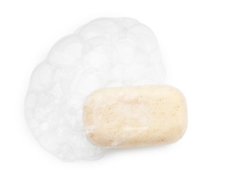 Photo of Soap with foam on white background, top view