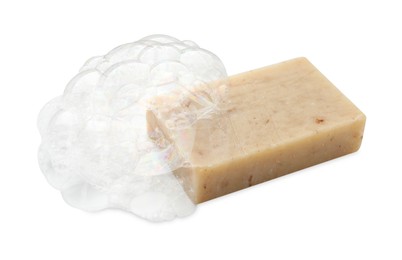 Photo of Bar soap with foam on white background