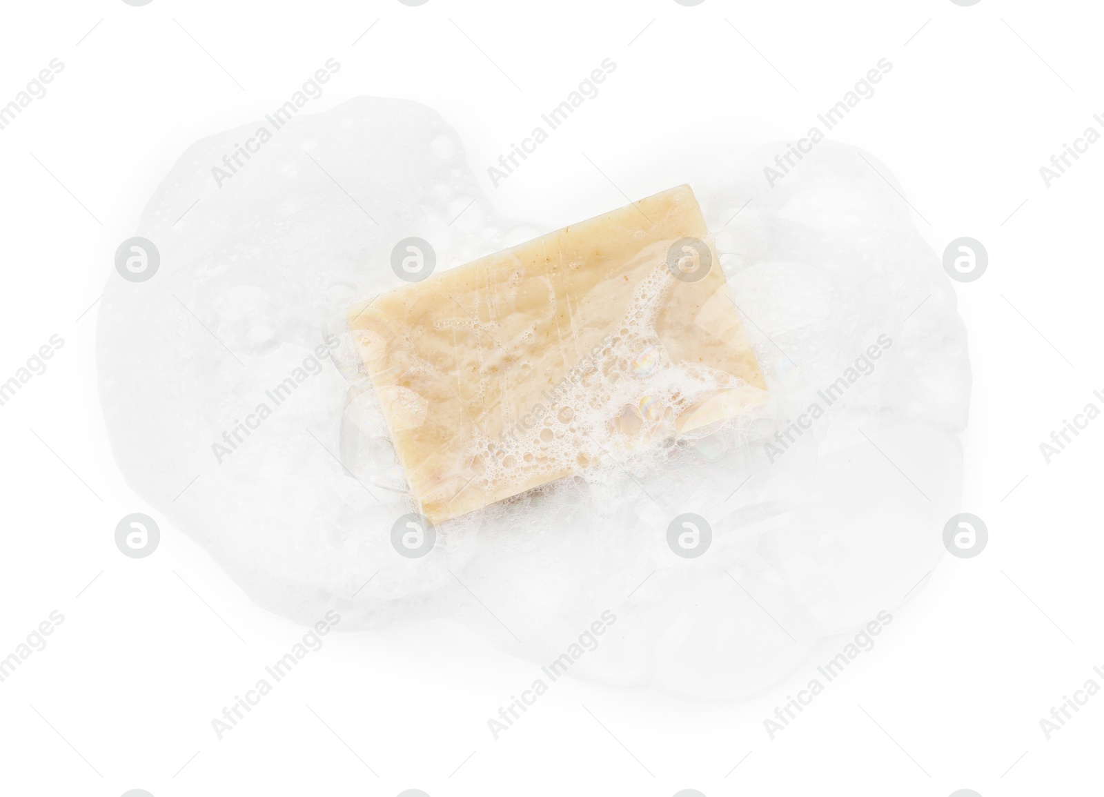 Photo of Beige soap with foam on white background, top view