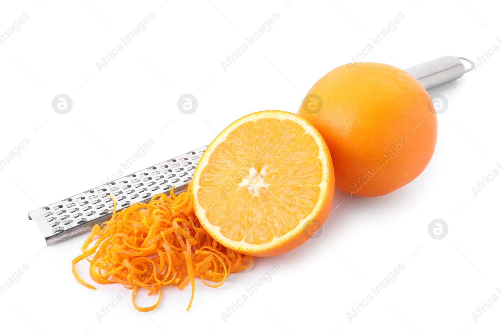 Photo of Pile of fresh orange zest, fruits and grater isolated on white