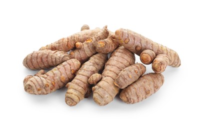 Photo of Pile of raw turmeric roots isolated on white