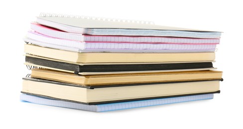 Photo of Stack of different notebooks isolated on white