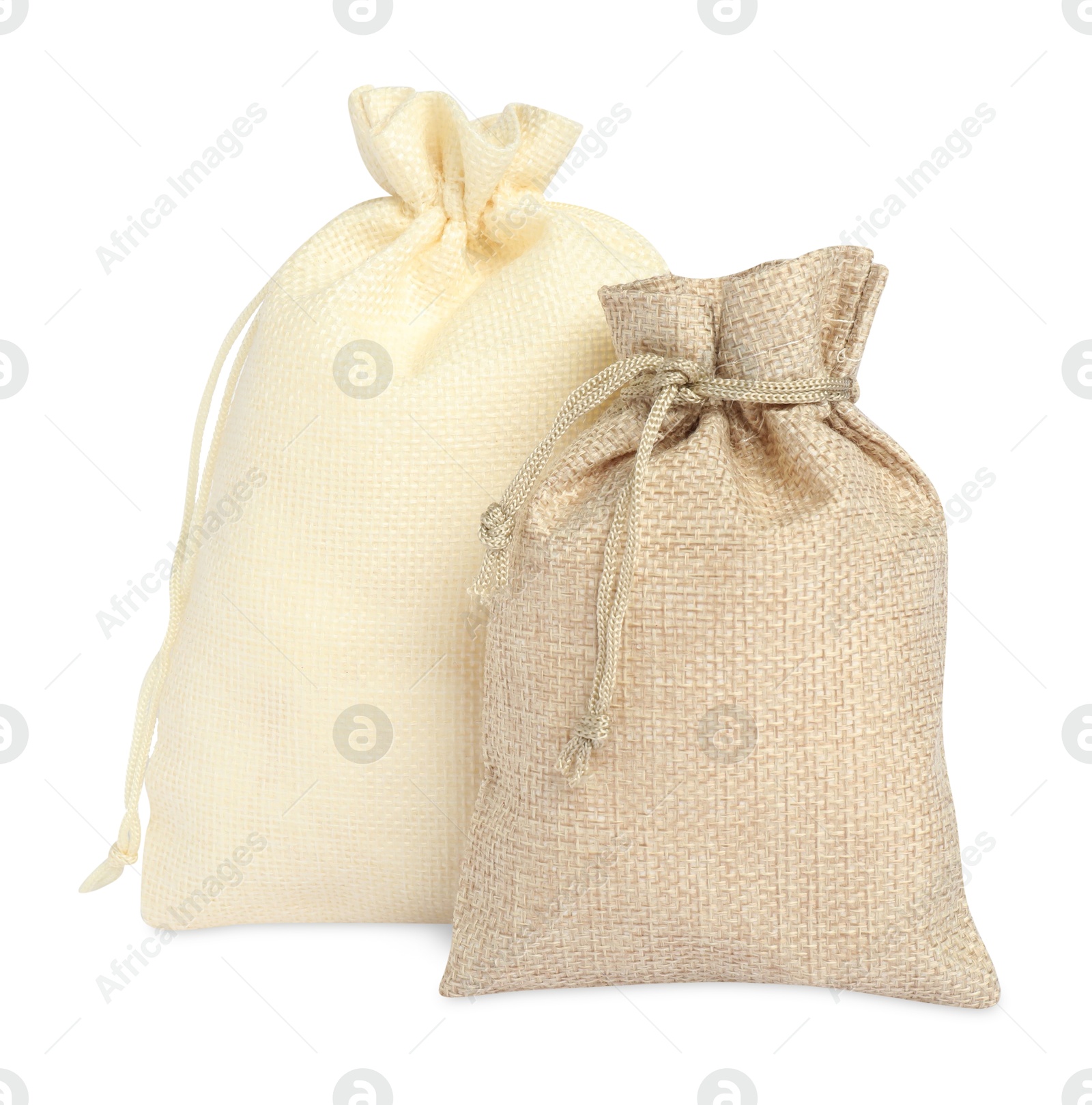 Photo of Two beige burlap sacks isolated on white