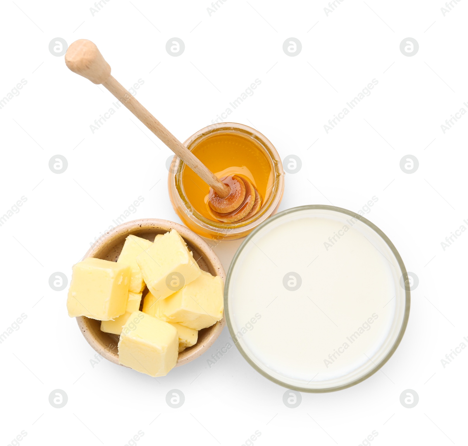 Photo of Sweet honey, butter and milk isolated on white, top view