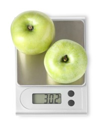 Photo of Electronic kitchen scale with apples isolated on white, top view