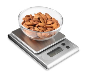 Photo of Electronic kitchen scale with almonds isolated on white