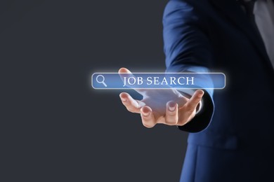 Image of Job search. Businessman holding virtual search bar on grey background, closeup