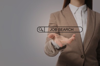 Job search. Businesswoman holding virtual search bar on grey background, closeup