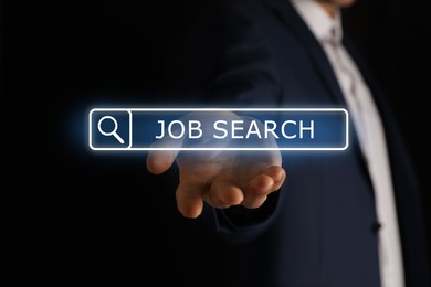 Image of Job search. Businessman holding virtual search bar on black background, closeup