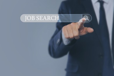 Image of Job search. Businessman touching virtual search bar on grey background, closeup