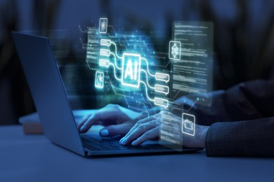 Image of Artificial intelligence. Woman using laptop at table, closeup. Scheme with AI and other icons over computer. Toned in blue