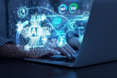 Image of Artificial intelligence. Woman using laptop at table, closeup. Scheme with AI and other icons over computer. Toned in blue