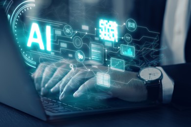 Image of Artificial intelligence. Man using laptop at table, closeup. Scheme with AI and other icons over computer. Toned in blue