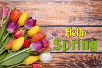 Image of Hello Spring. Bouquet of beautiful tulips on wooden background, top view