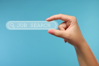 Job search. Woman holding virtual search bar on light blue background, closeup