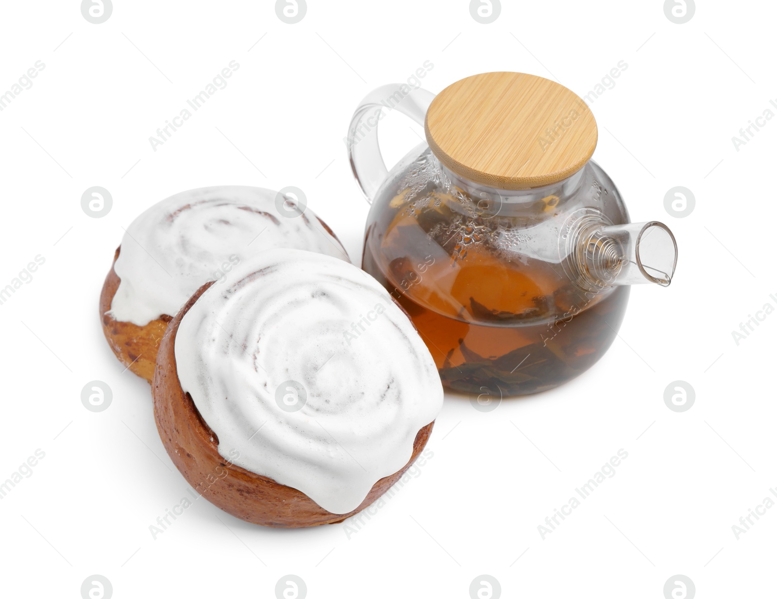 Photo of Tasty cinnamon rolls with cream and tea isolated on white