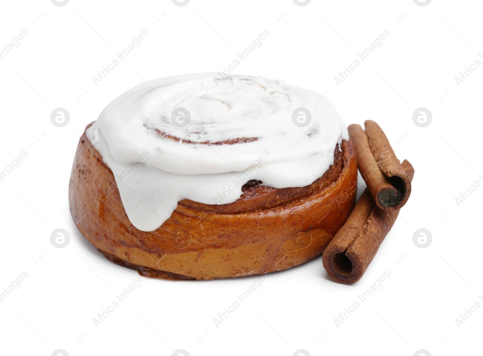 Photo of Tasty cinnamon roll with cream and sticks isolated on white