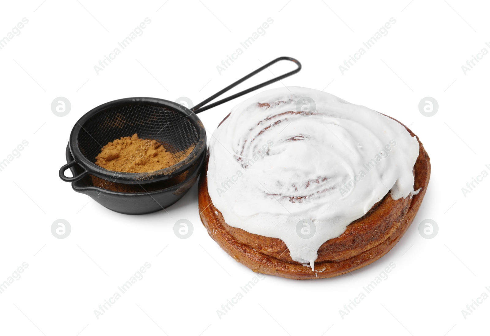 Photo of Tasty roll with cream and cinnamon isolated on white